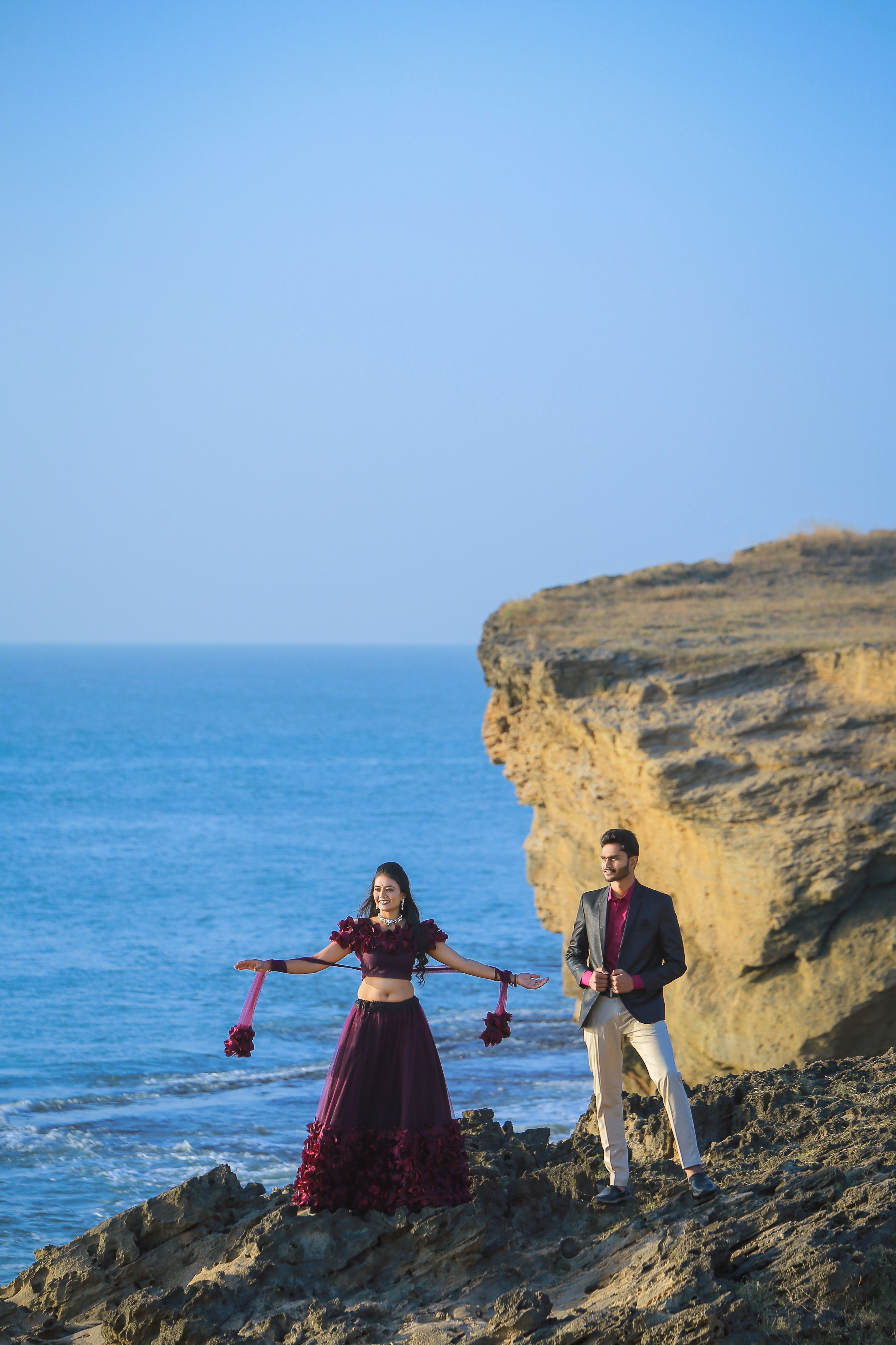 Beautiful Couple Standing on Mountain Top · Free Stock Photo