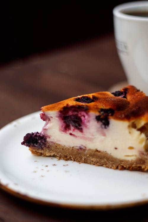 Blueberry Pie on White Ceramic Plate