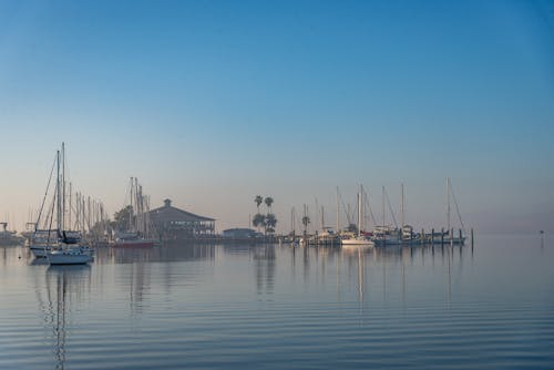 Free stock photo of blue sky, boats, haze