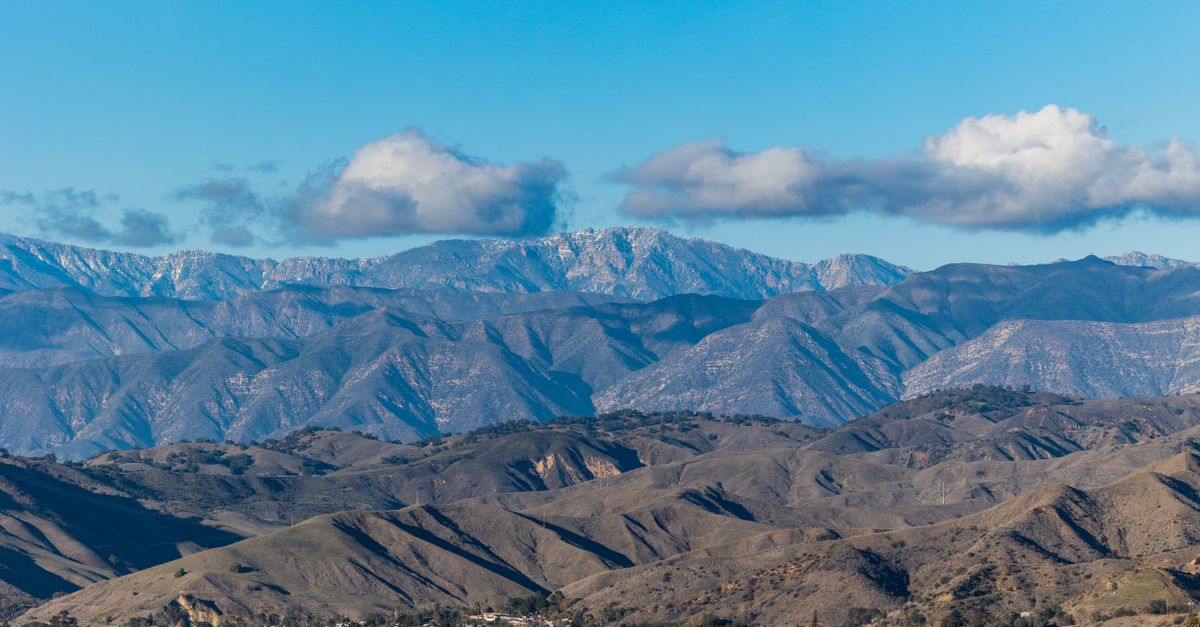 Breathtaking view of mountain ranges with clear blue sky in Ventura, California.