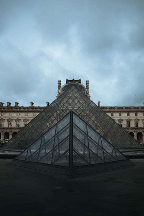 Free Moody shot of the glass pyramid at The Louvre Museum in Paris, France. Stock Photo