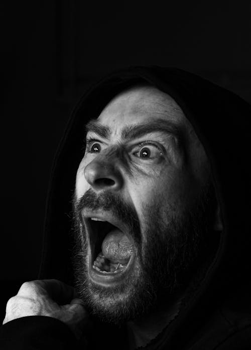 Free Grayscale Photo of a Man Screaming
 Stock Photo