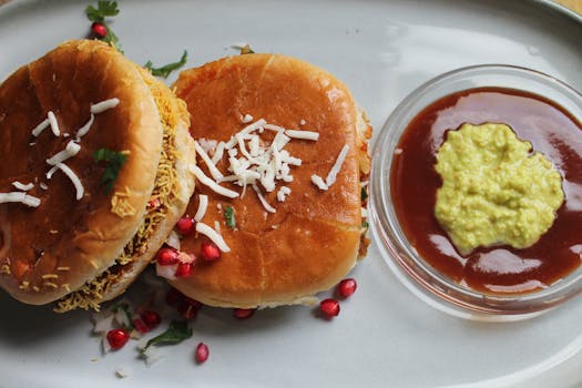Top view of spicy Indian street food burgers served with flavorful chutney dips.