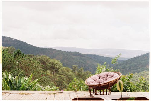 Cozy Chair on Terrace in Mountain Landscape