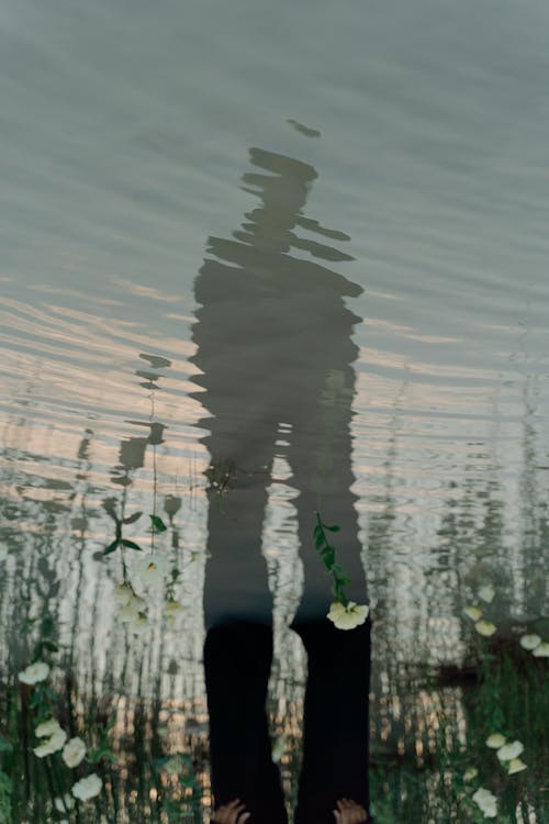 Reflection of a Person in the Water