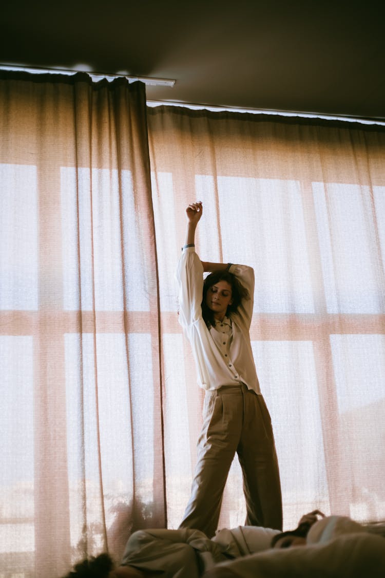 Teenage Girl Stretching Her Arms