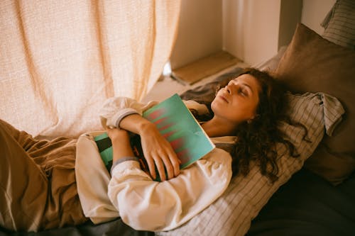 Teenage Girl Hugging Vinyl Record to her Chest