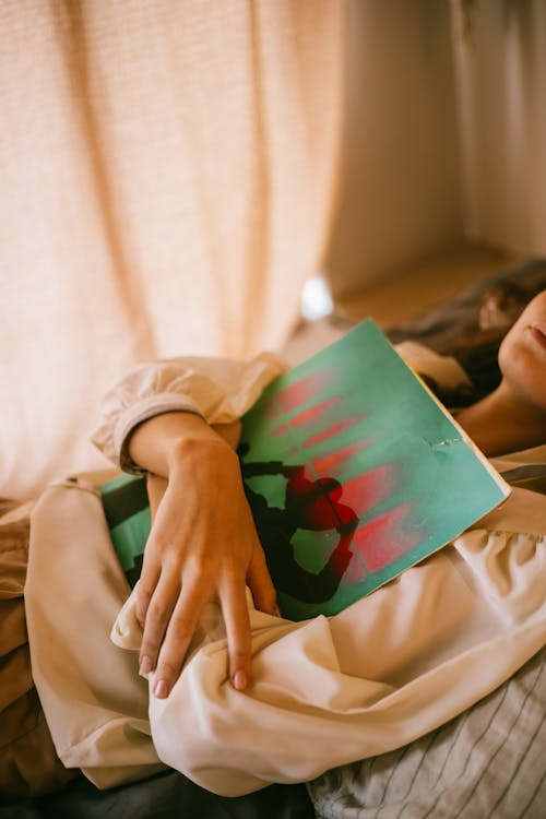 Teenage Girl Hugging Vinyl Record to her Chest