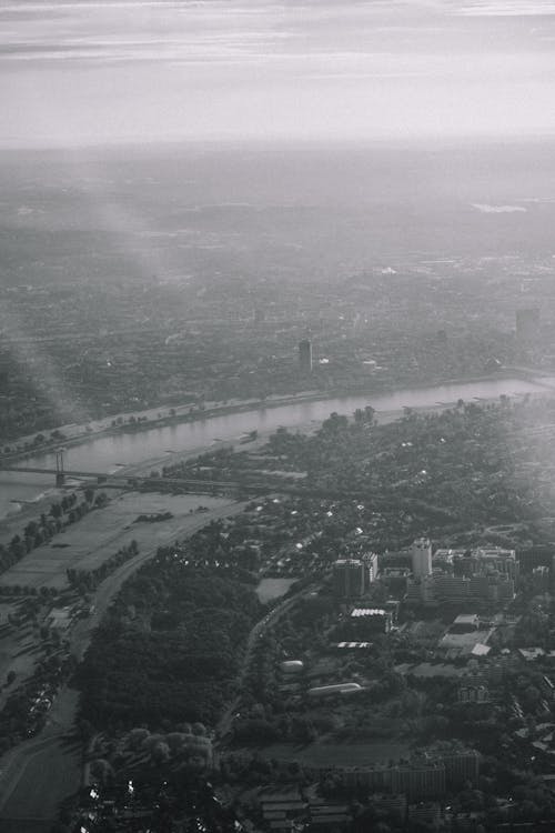 Grayscale Photo of City Buildings