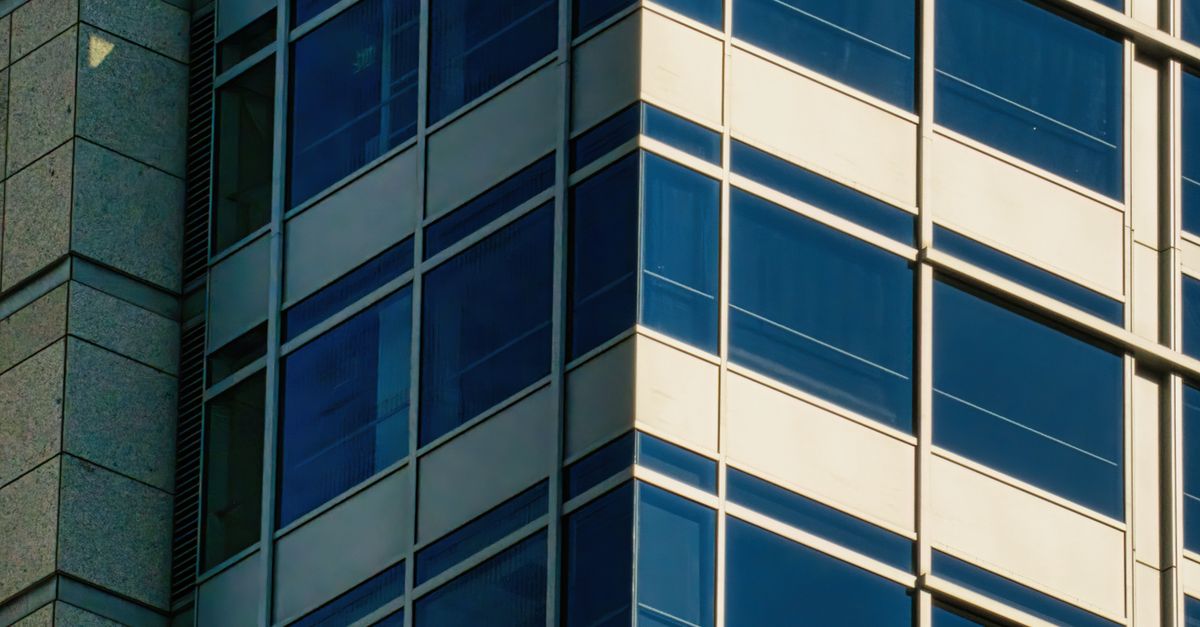 High Rise Window Screen Glass Panel Windows on a High Rise Building · Free Stock Photo