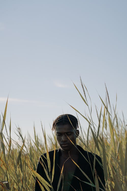 A Male Model Posing in a Crop Field
