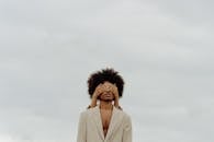 Model with Covered Eyes