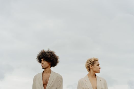 Man and Woman Standing Side by Side
