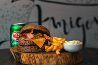 Burger With Fries on Brown Wooden Chopping Board