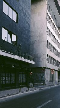 Explore the architectural contrast of modern buildings on a quiet street in İstanbul, Turkey.