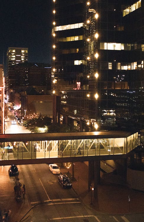 Free People Walking on Sidewalk during Night Time Stock Photo