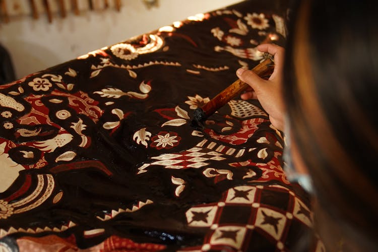 Close Up Of Woman Decorate Fabric