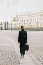 Woman Walking in City