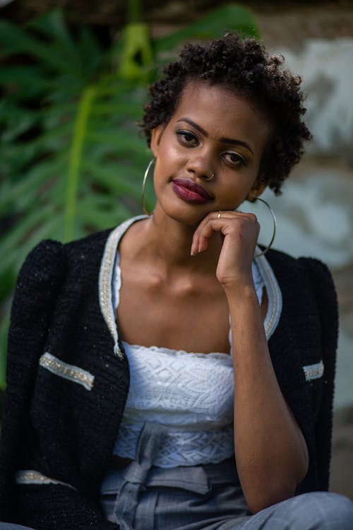 A Woman with a Short and Curly Hair