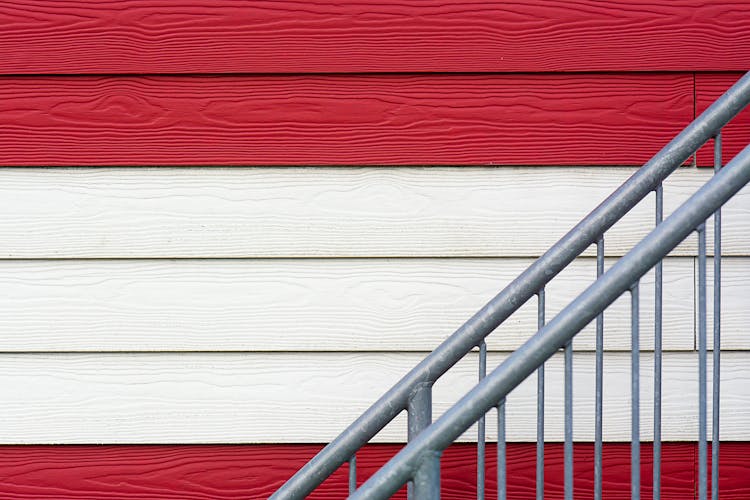 Wooden Wall And Metal Railing