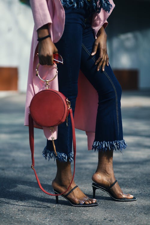 Woman Holding Round Leather 2-way Handbag