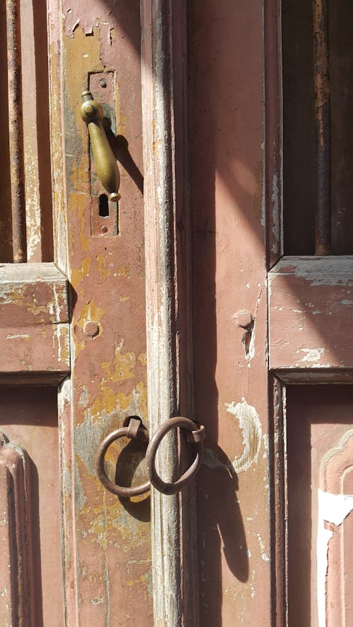 Brown Wooden Door With Brass Door Lever