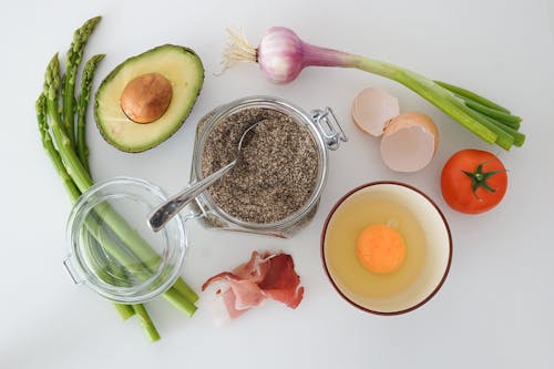 2223: Free Spices Avocado and Ingredients on Table Stock Photo