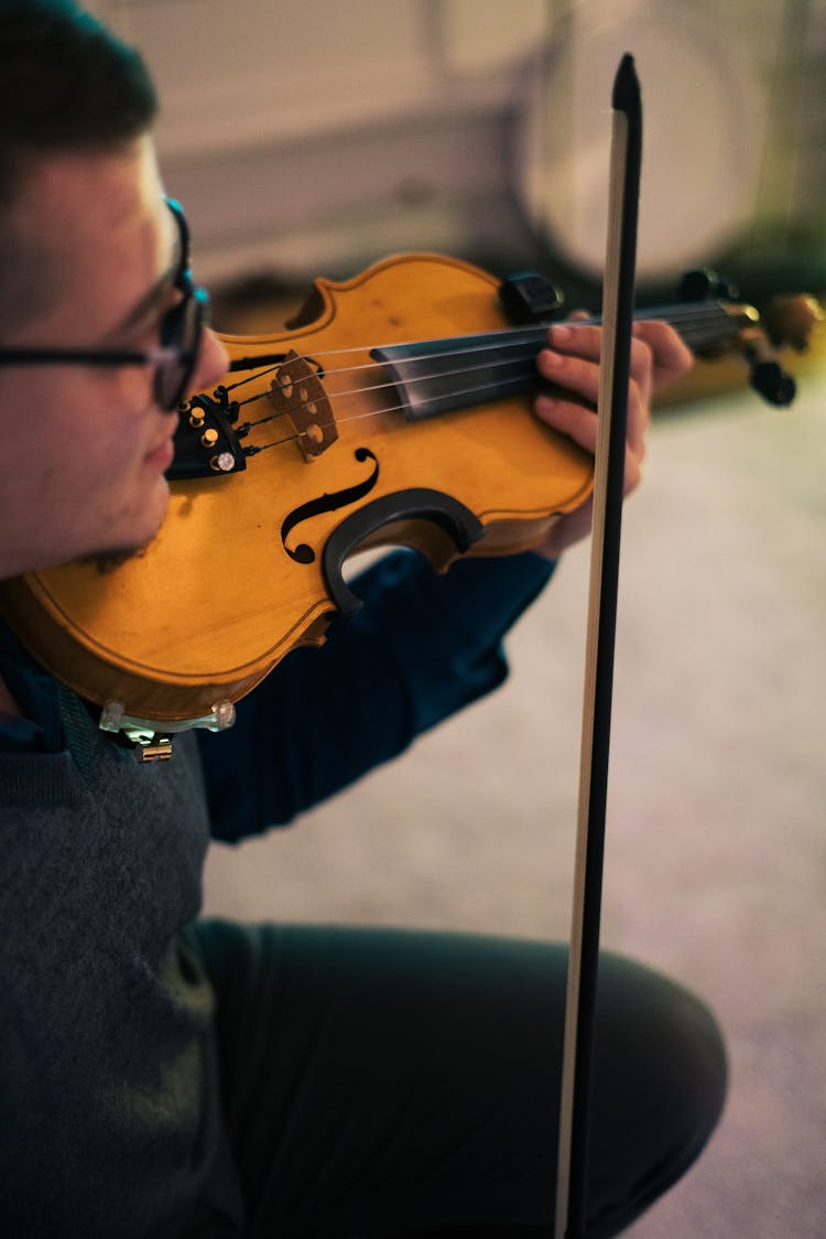 Man Holding Violin