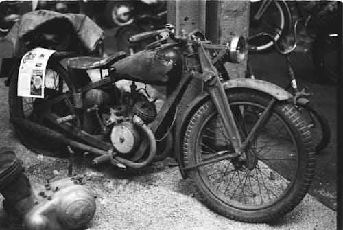 Grayscale Photo of Old Motorcycle