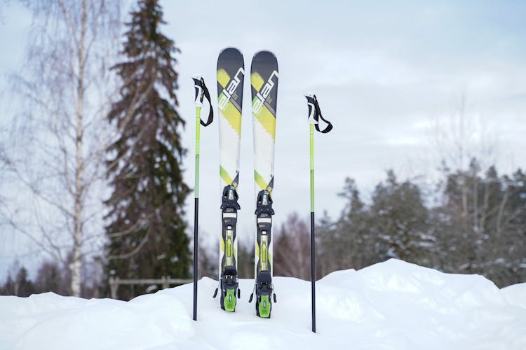 Skis And Ski Poles On Snow