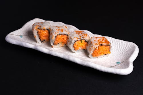 Sushi Roll on White Ceramic Plate