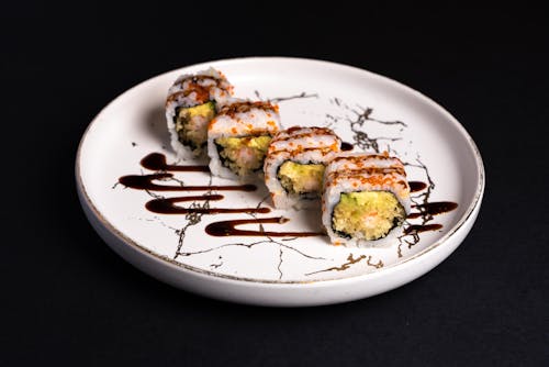Sushi Roll on White Ceramic Plate