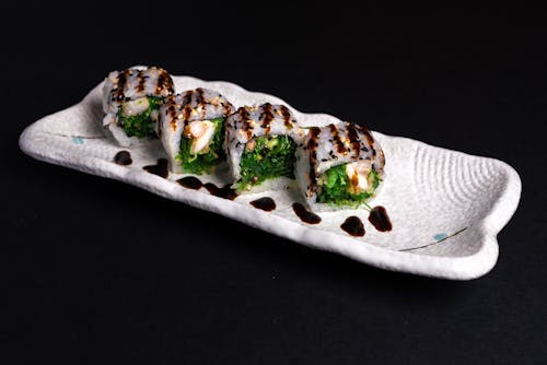 Free Sushi Roll on White Ceramic Plate Stock Photo