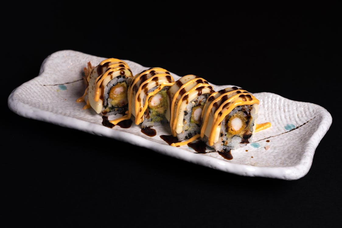 Sushi Roll on White Ceramic Plate