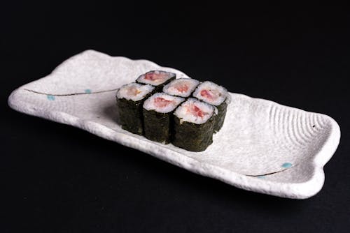 Free Sushi Roll on White Ceramic Plate Stock Photo