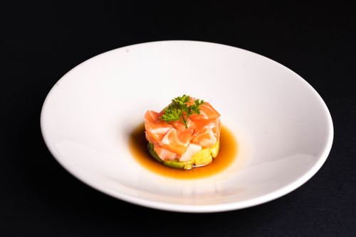 Free Elegant salmon sashimi served with parsley on a white plate. Stock Photo
