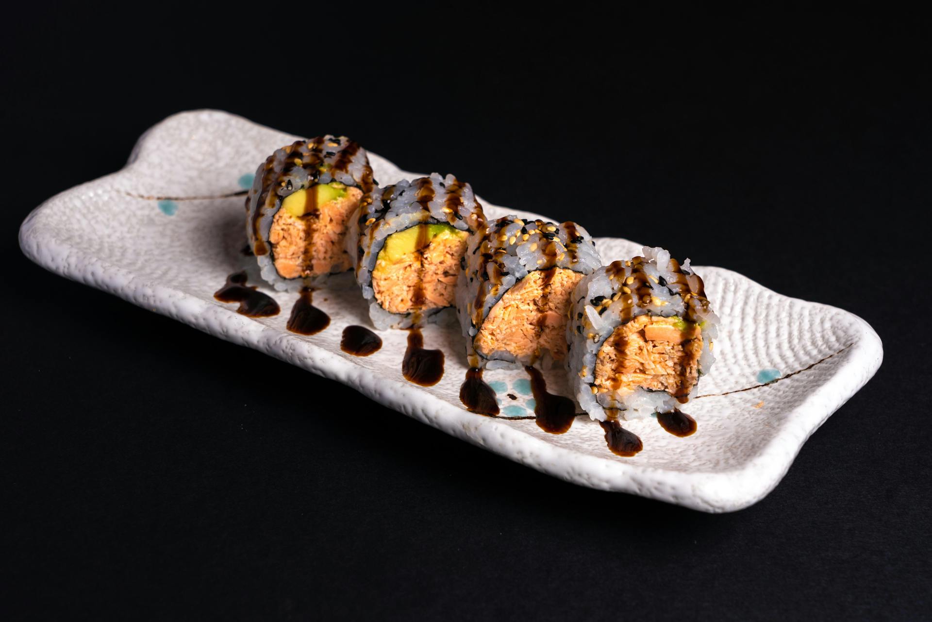 Tuna Sushi with Sauce on a Ceramic Tray