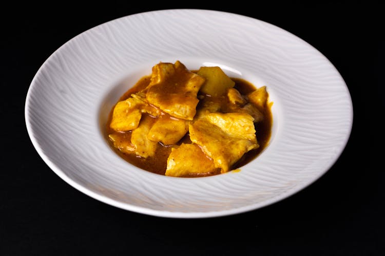 Curry Dish In A White Bowl