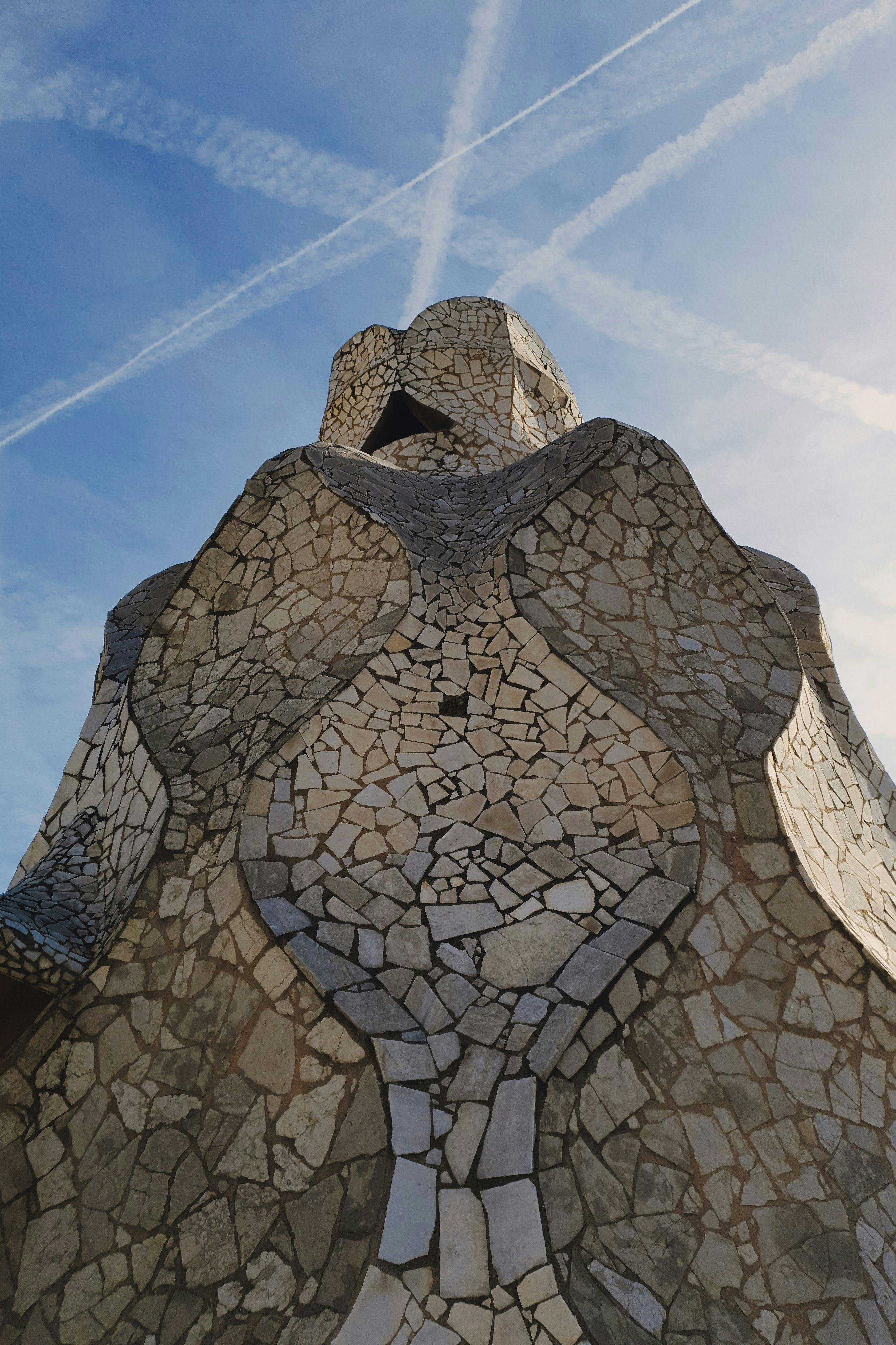 grey concrete monument under the blue sky