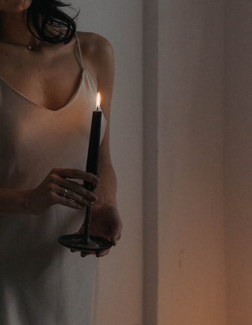 Free Woman Holding Burning Candle Stock Photo