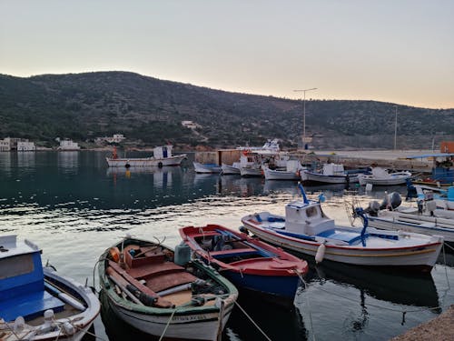 Boats in Water in Port in Mountains Landscape