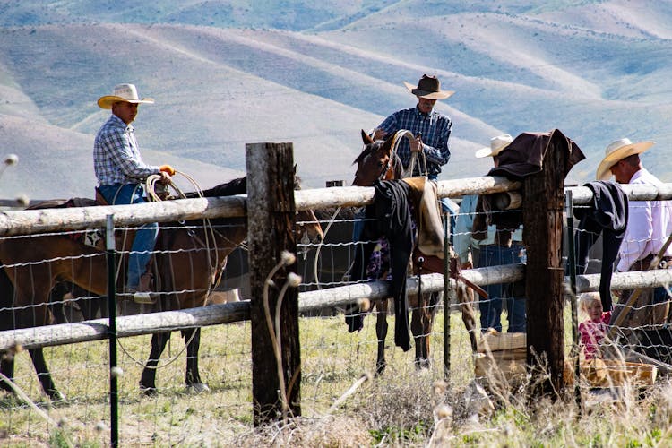 Photography Of People Riding Horses