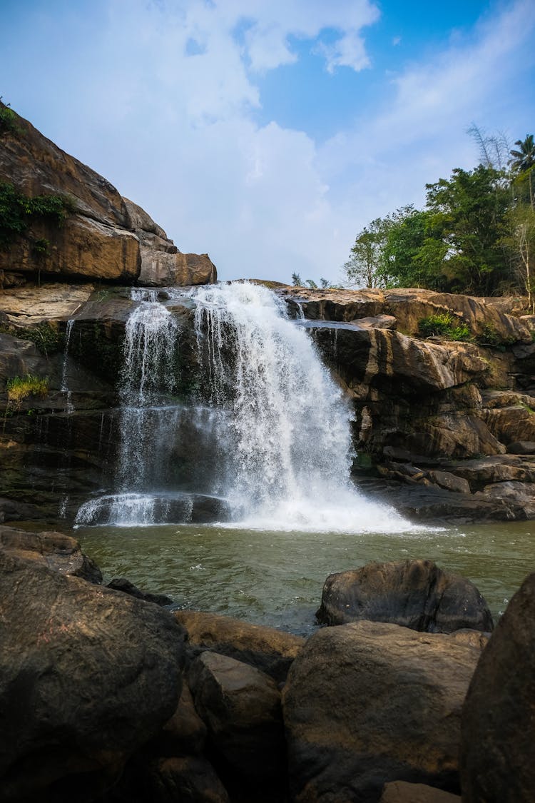 Clouds Over Waterfall