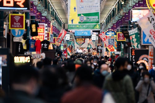 People Walking on a Crowded Street