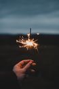 Hand Holding Sparklers