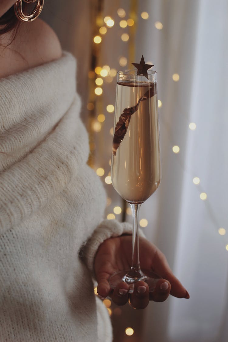 Close Up Of Woman Holding Champagne Glass