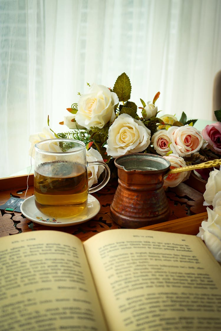 Book And Tea On Table