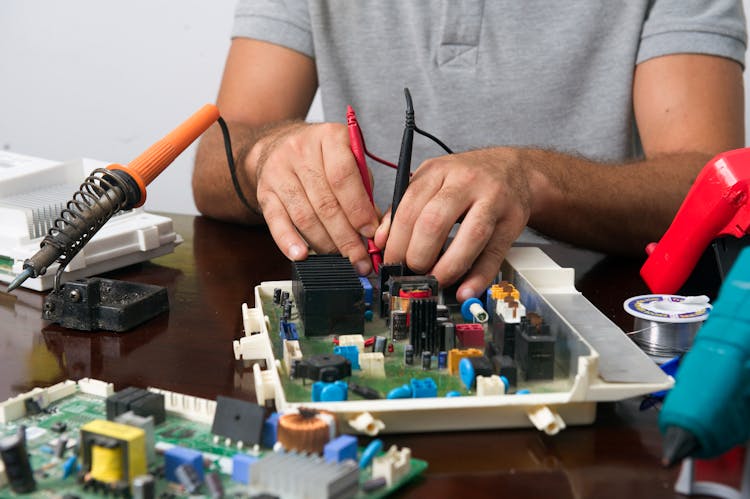Man Working With Computer Components