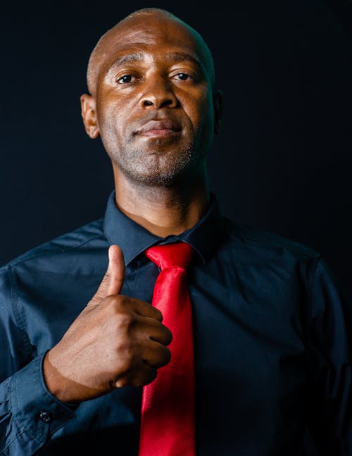 Free Man in Blue Dress Shirt and Red Necktie Stock Photo