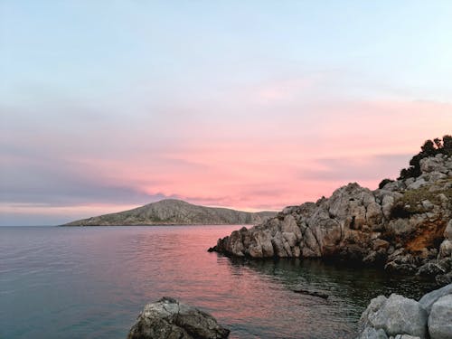 Calm Sunset over Rocky Shore